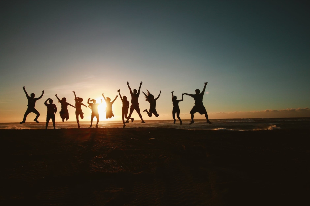 Photo of people jumping